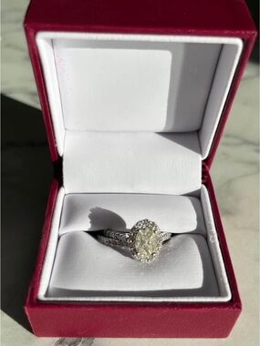 Helzberg Diamonds Oval Halo Engagement Ring in White and Yellow